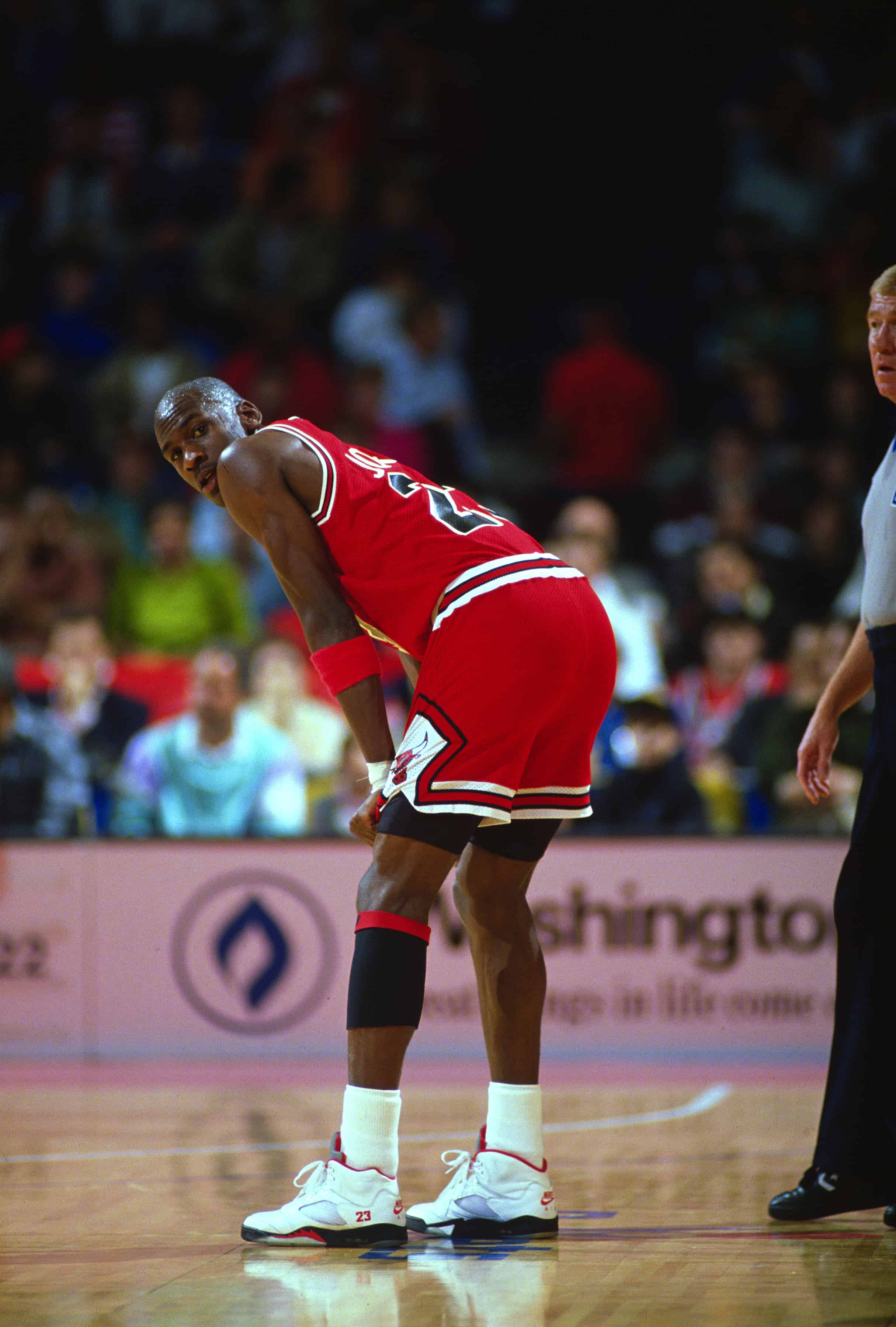 michael jordan wearing jordan 5 fire red