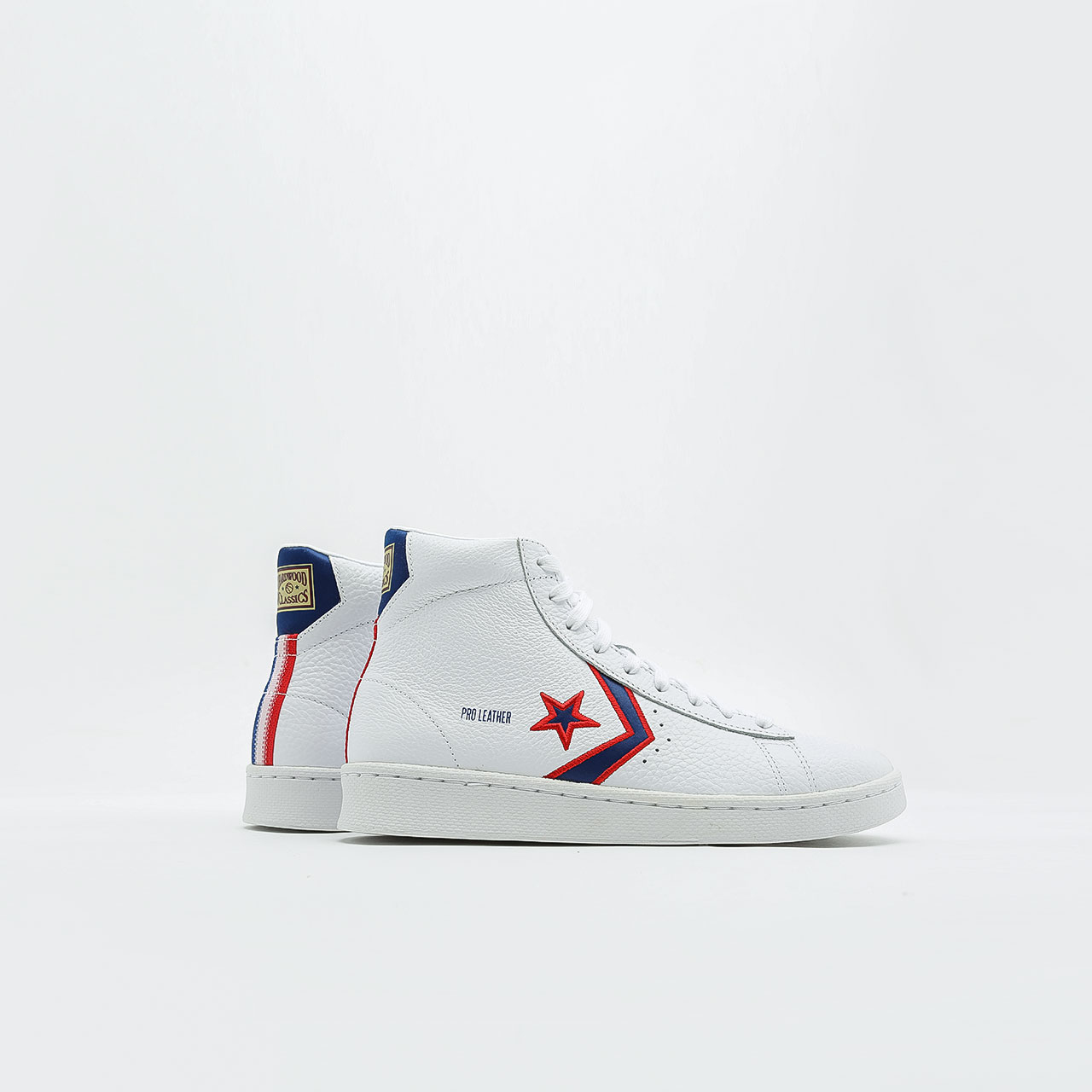 Купить белые кеды Pro Leather Mid от Converse (167058) по цене 5160 рублей